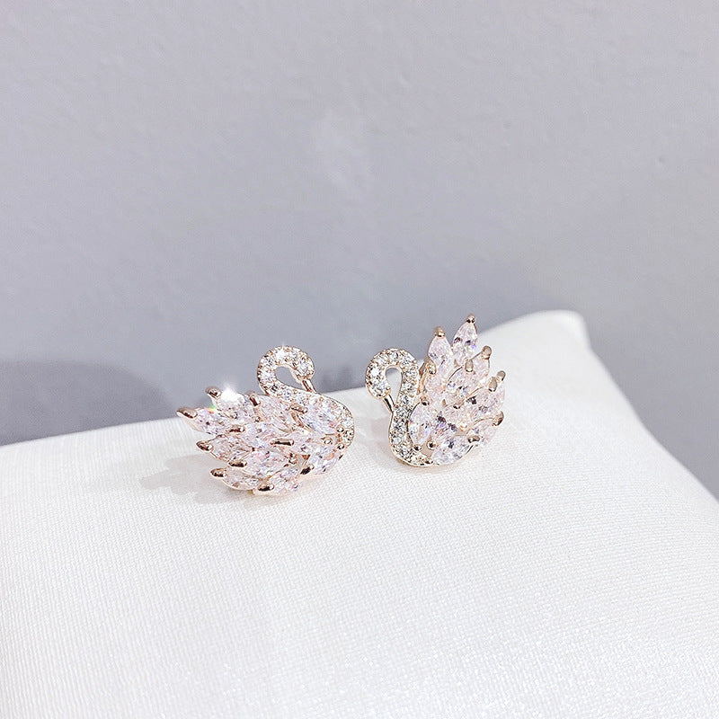 Swanin around earrings